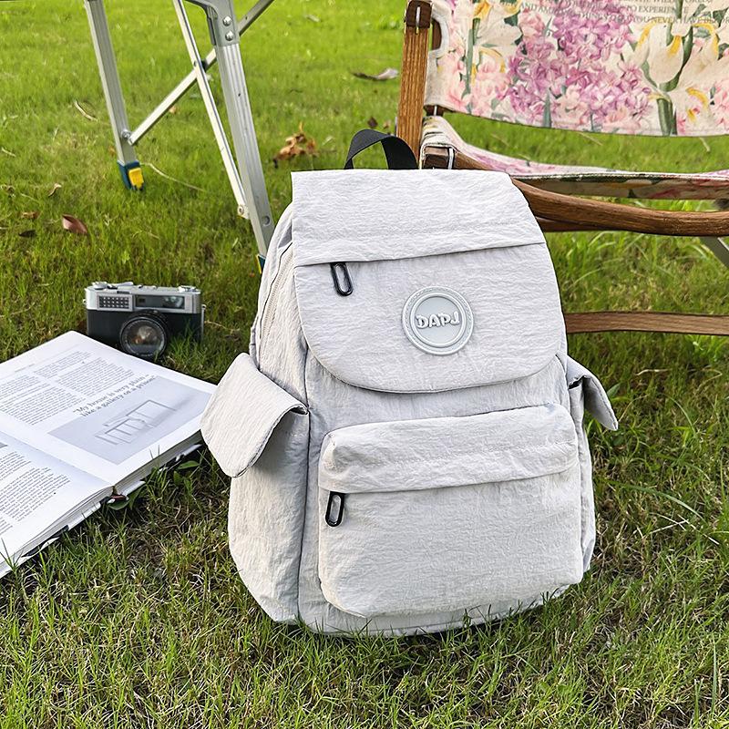 Легкий, модный и вместительный школьный рюкзак, простой универсальный новый дорожный рюкзак для студента колледжа